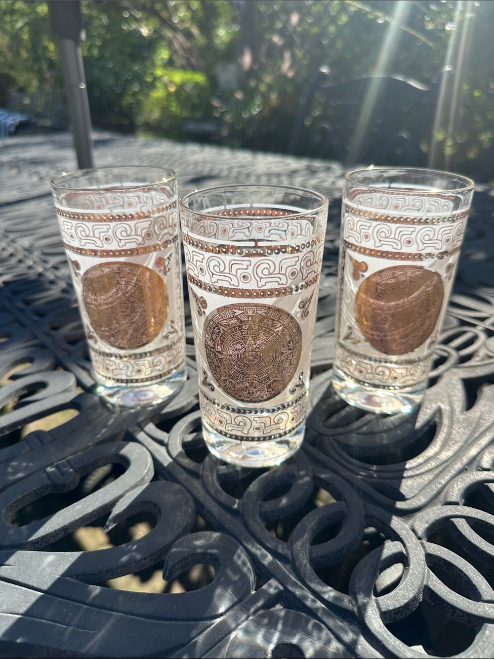 Set of 3 Hazel atlas Gold Aztec Medallion Design glasses like new